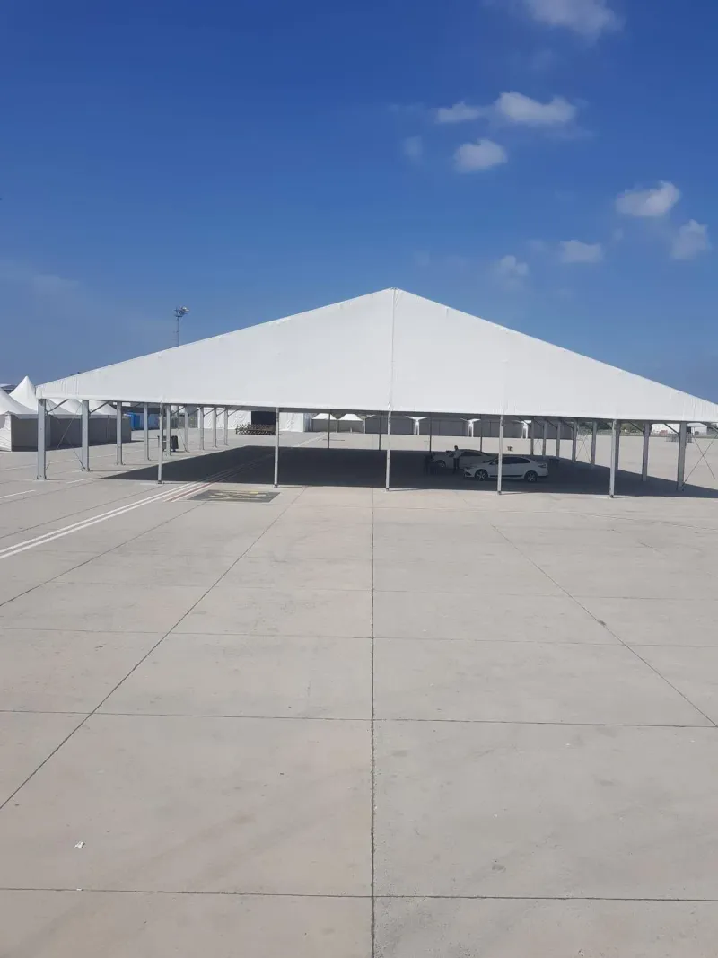 Tent, stage and technical equipment integration at an event site