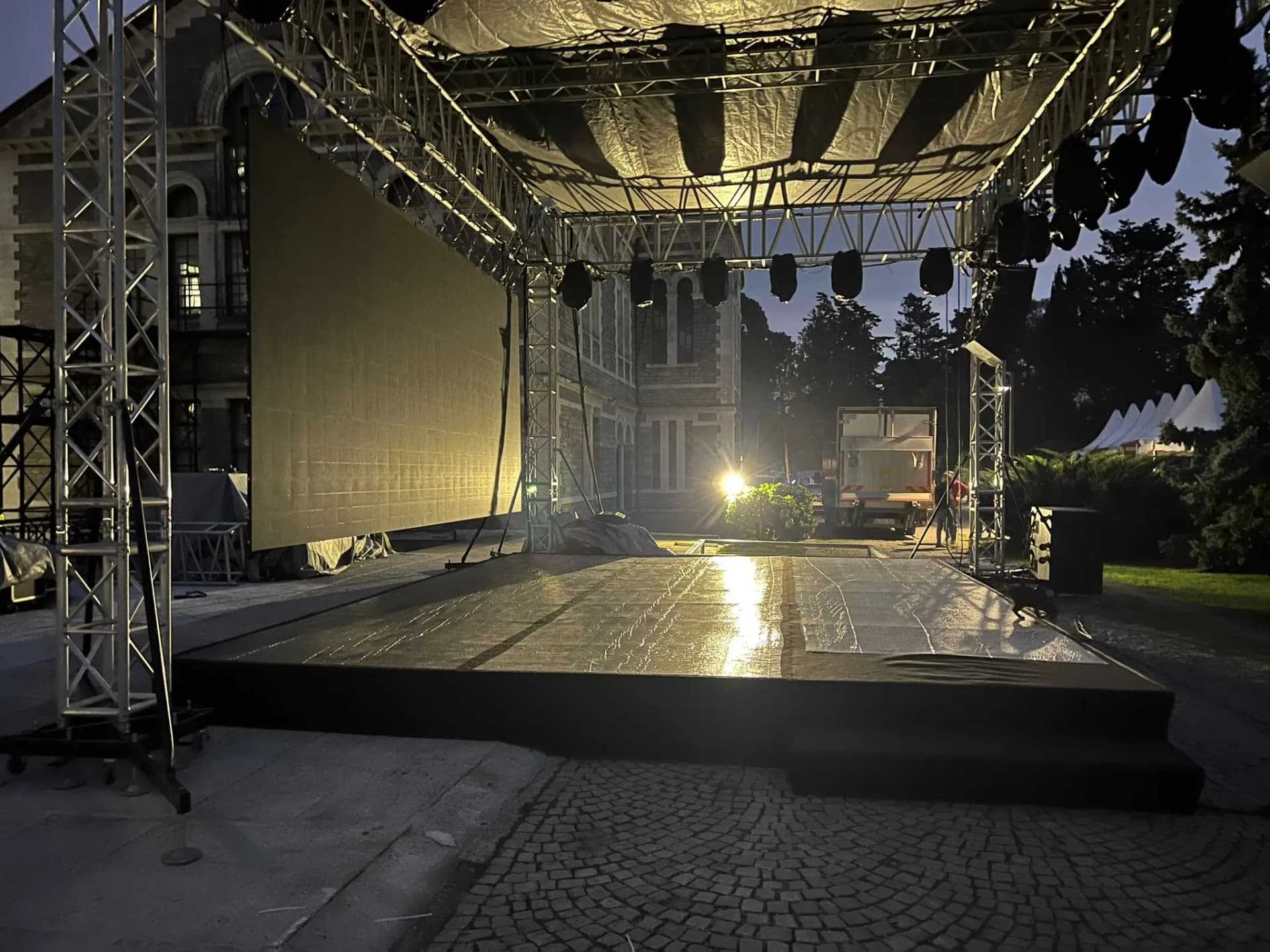 Corporate event stage portal truss installation