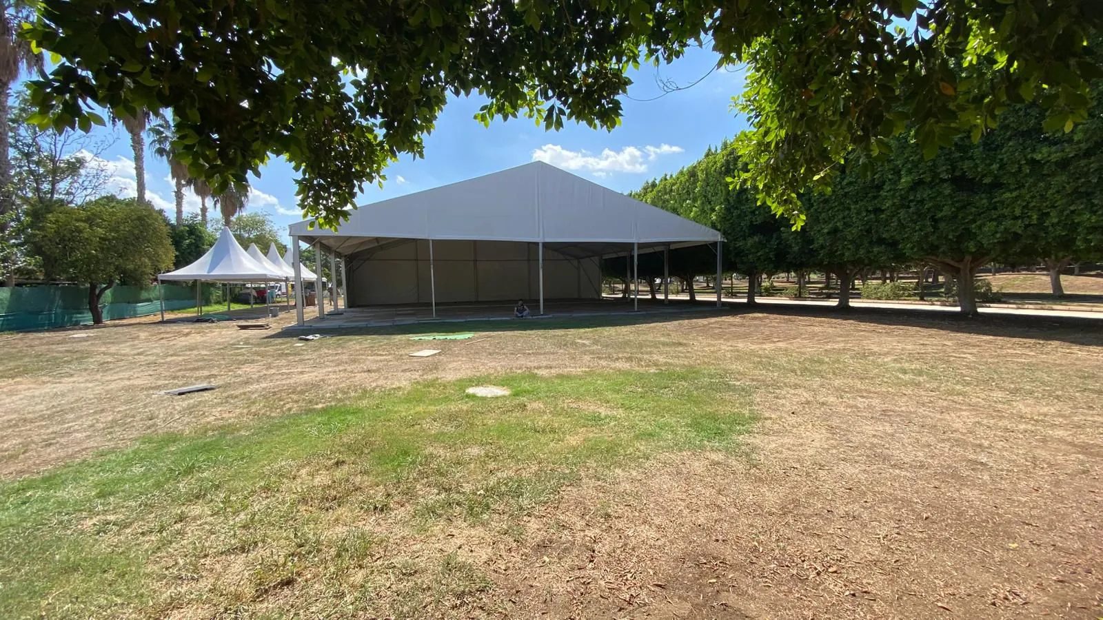 Outdoor tent area — ground conditions, access, and setup plan scouting example