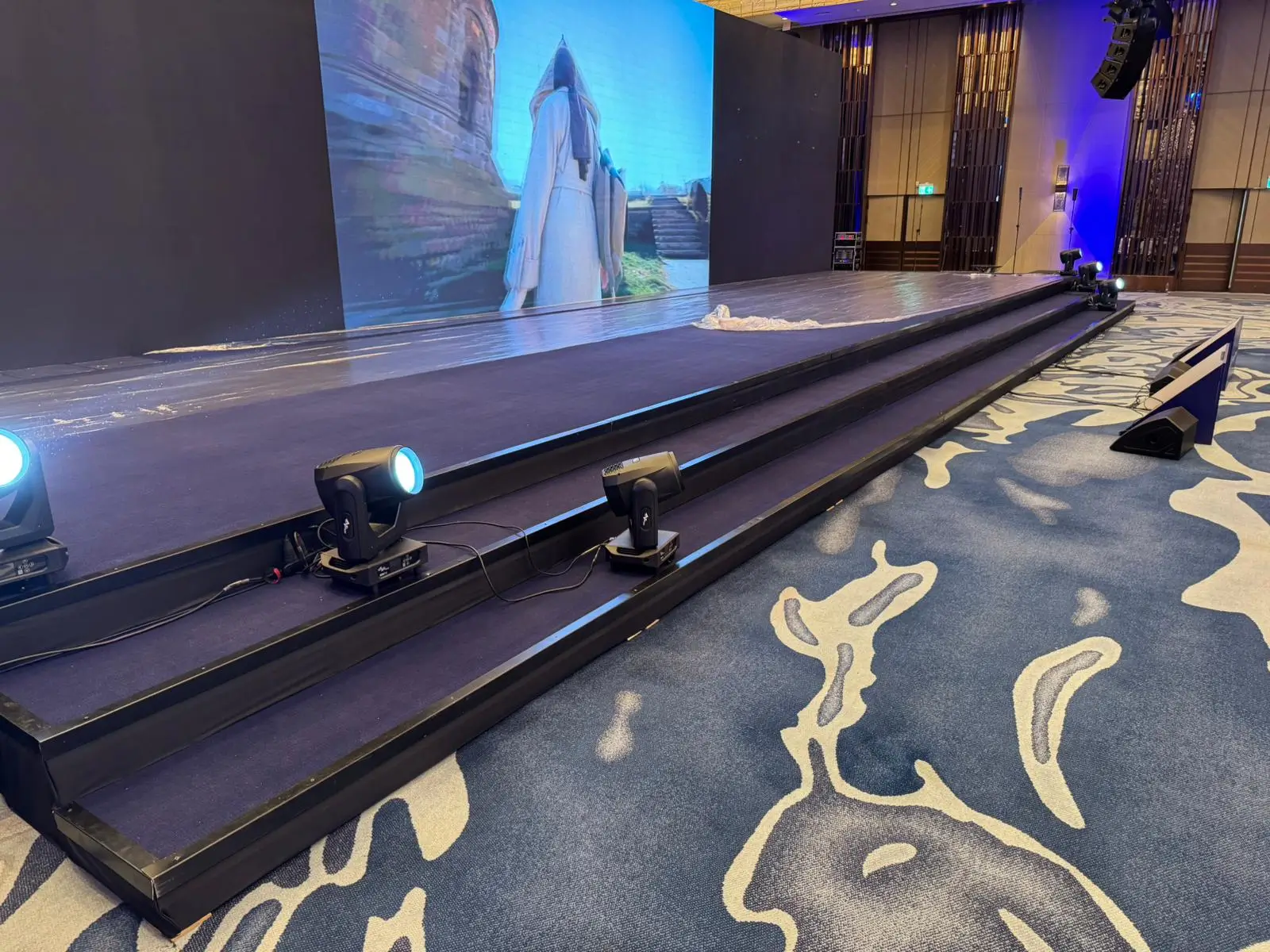 Increased visibility at crowded events with a podium stage