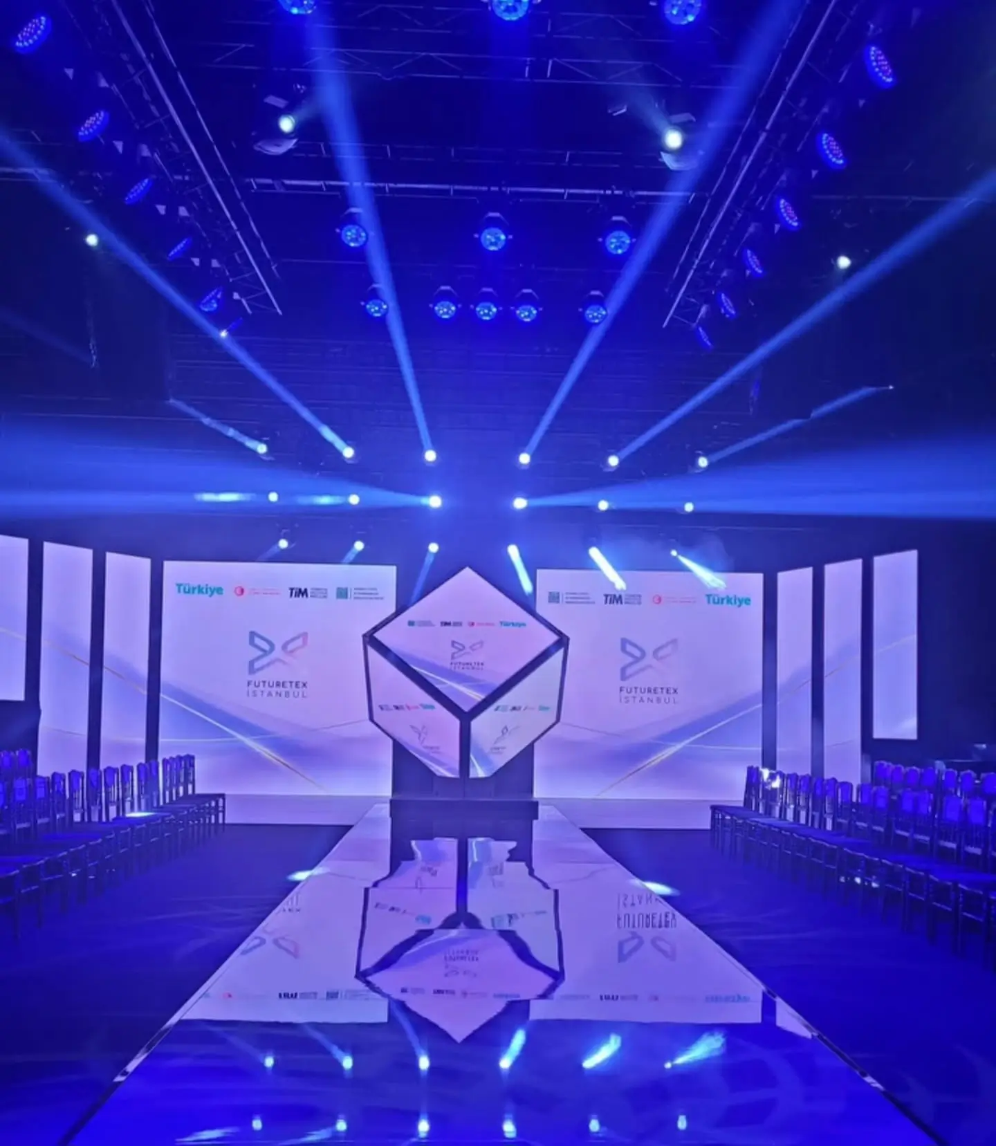 Fashion show stage installation – professional lighting and backdrop integration